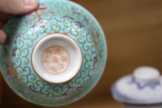 Five Chinese porcelain rice bowls, covers and stands, together with two spoons, second half 20th century, bowls 10.5cm diameter